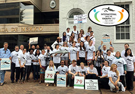 A group of people gathered in front of the Mexican Embassy in Washington DC, International Save the Vaquita Day 2015